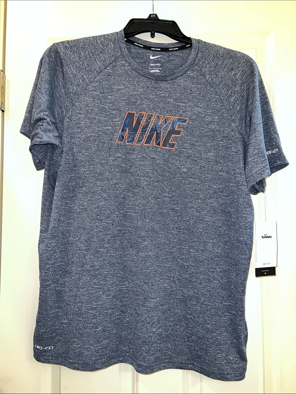 Nike Men’s Blue Short Sleeve swim shirt